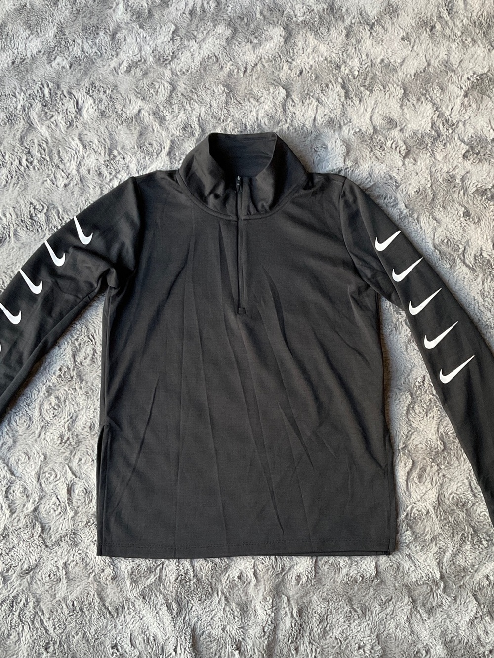 Nike Black Quarter-Zip Performance Pullover with White Swoosh Accents